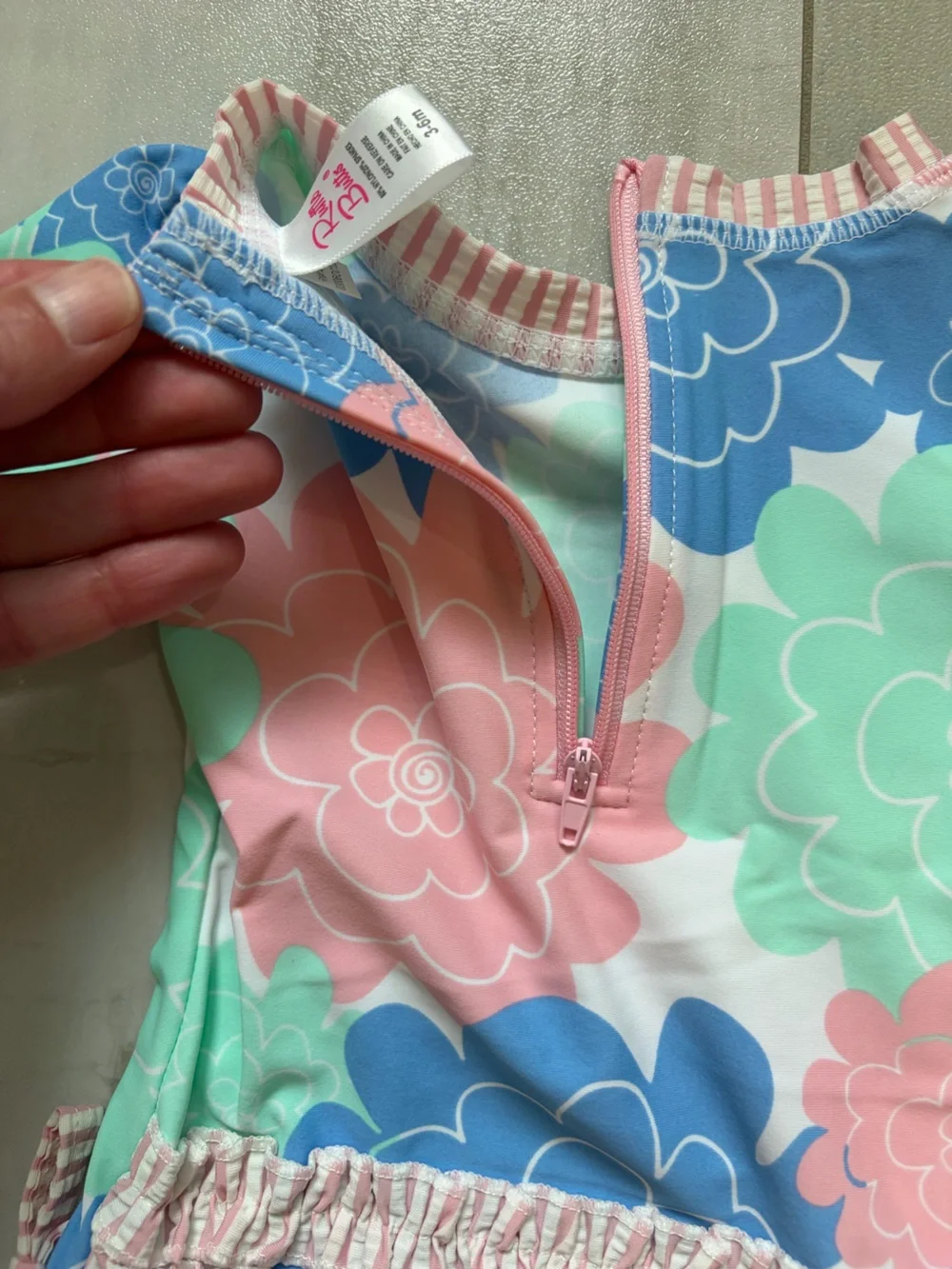 NWT RuffleButts Pastel Petals Long Sleeve RashGuard 1-piece Swimsuit Girls 3-6M